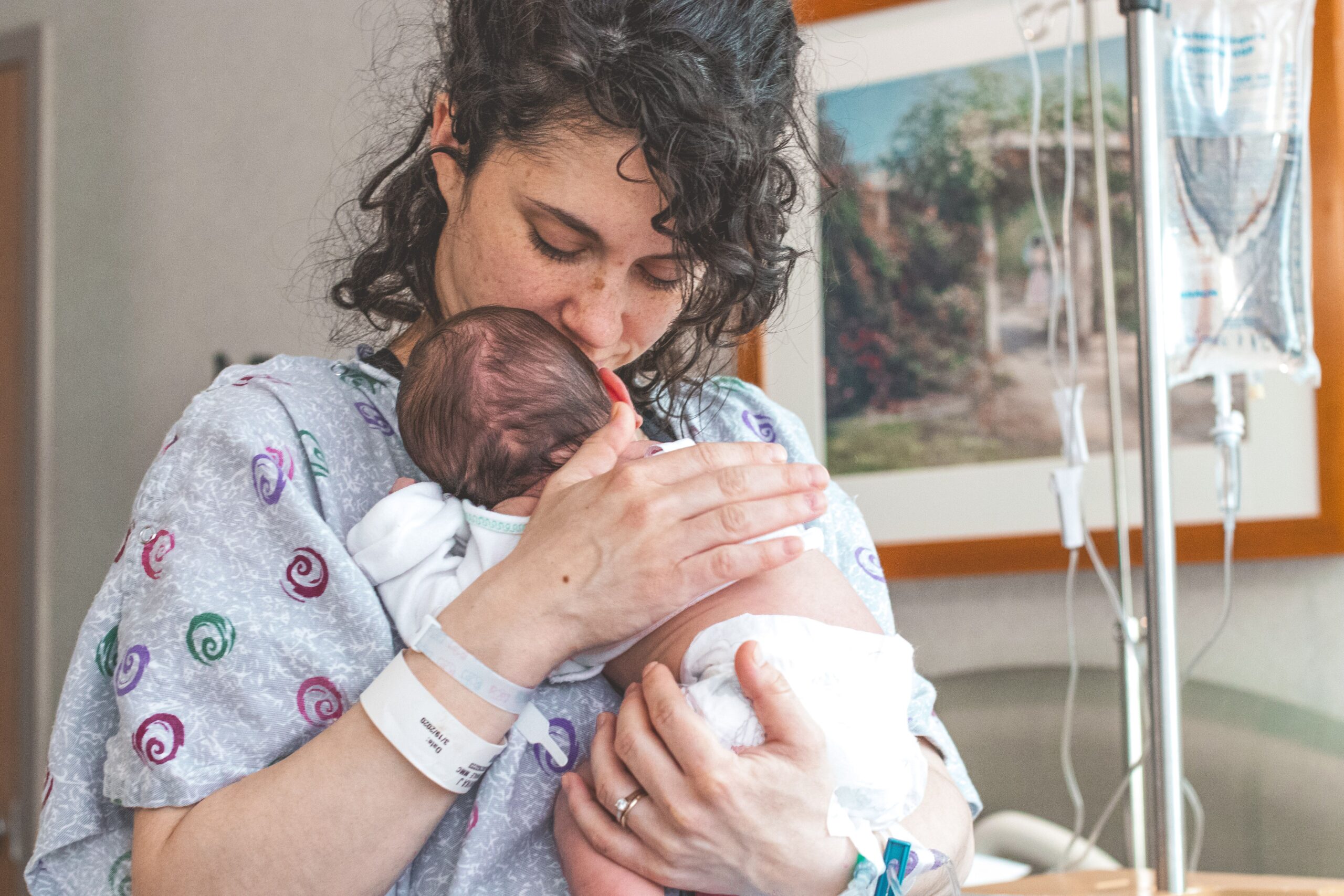 Mother recovering with her newborn after delivery