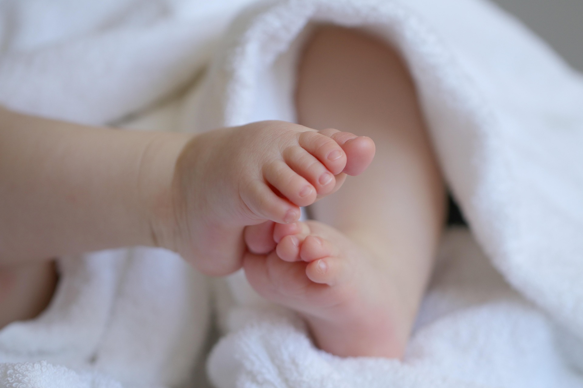 Newborn baby receiving gentle birth support
